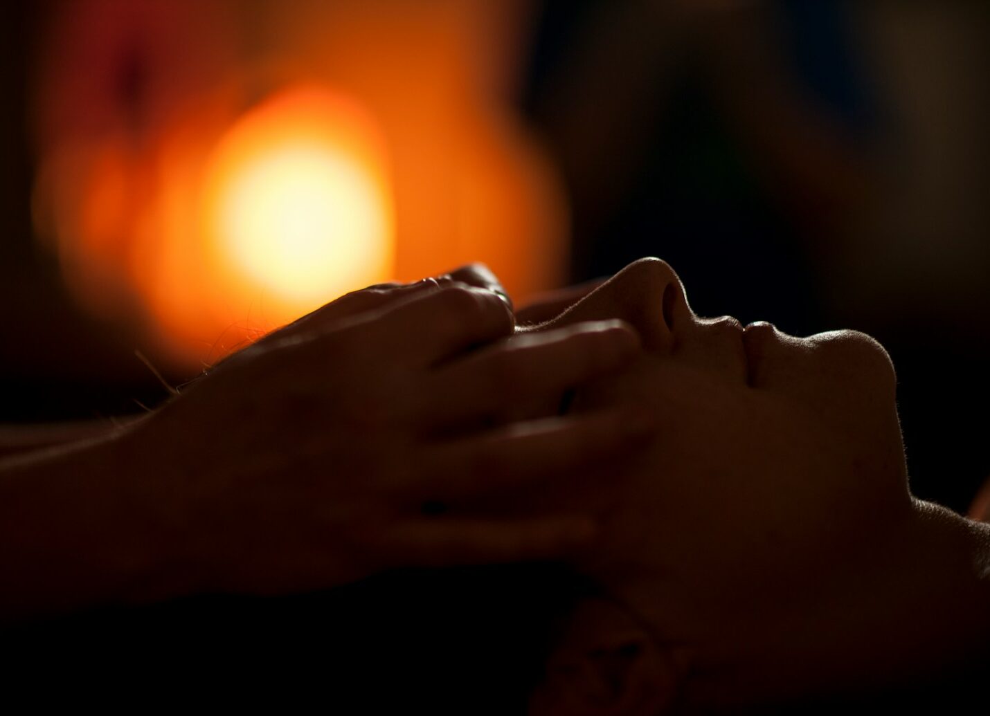 persons hand on top of sun