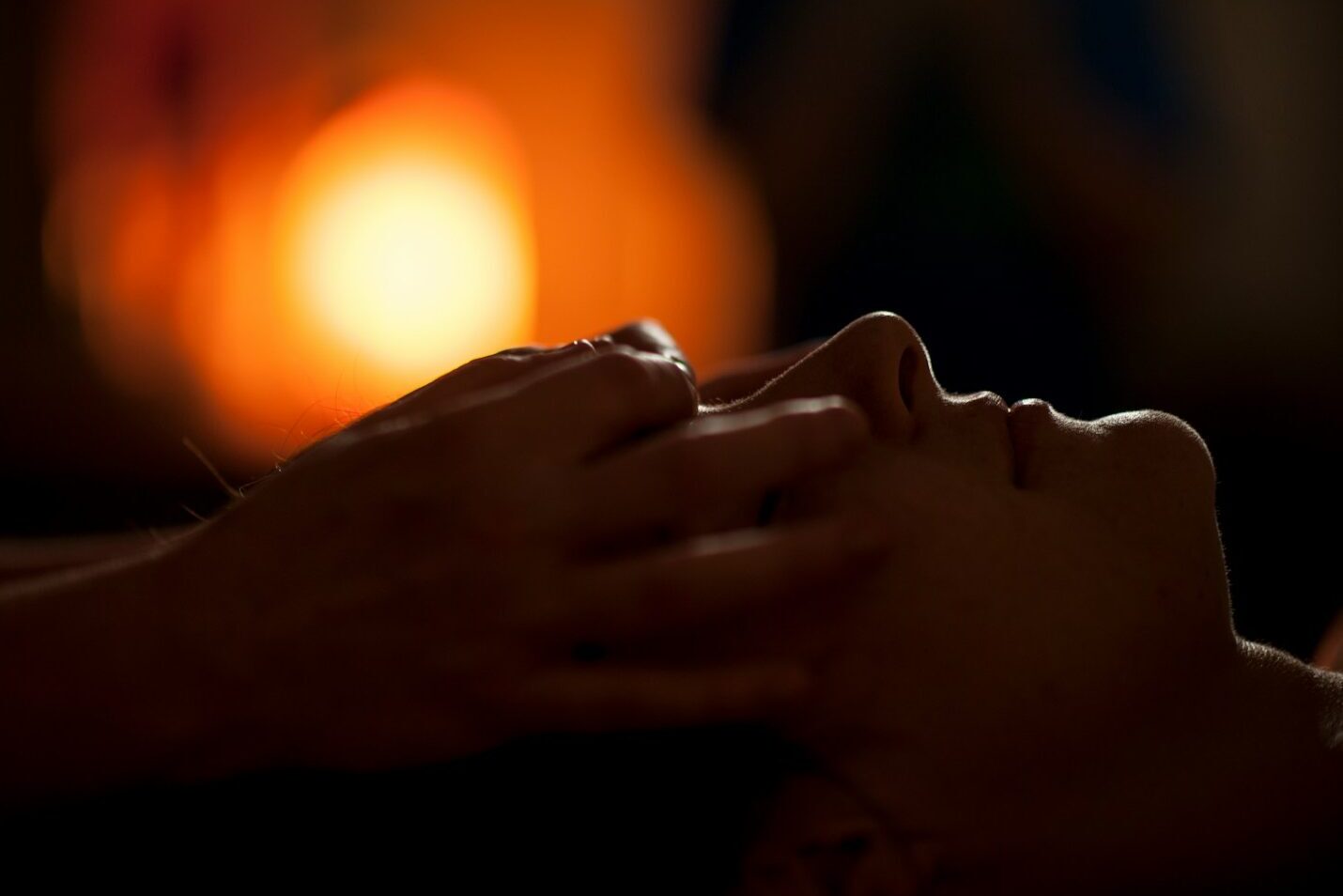 persons hand on top of sun
